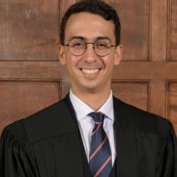 Picture of Ali Jebari in a graduation gown