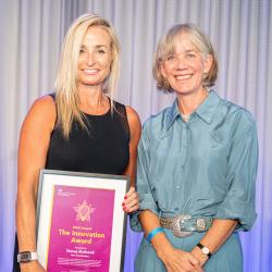 Stacey Rothwell, winner of the Innovation Award at the Government Science and Engineering Awards 2024, receiving her award for Rapid Video Response.
