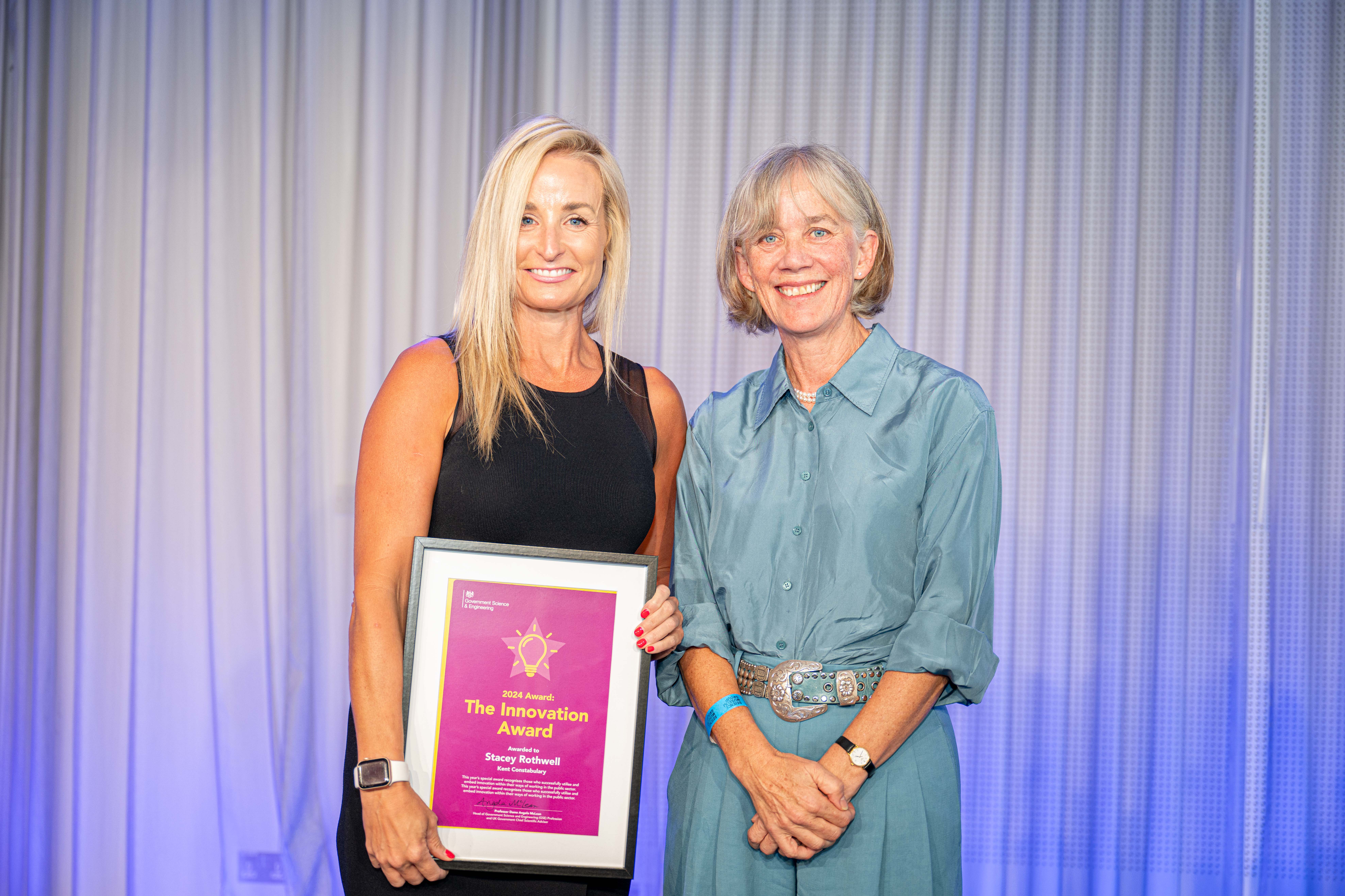 Stacey Rothwell being presented with the Innovation Award at the GSE Awards 2024. Stacey Rothwell, winner of the Innovation Award at the Government Science and Engineering Awards 2024, receiving her award for Rapid Video Response.