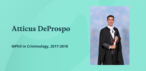 A photograph of Atticus DeProspo at his graduation, wearing his graduation gown and holding his certificate.