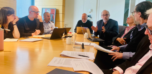 A photograph of Professor Leo Zaibert conducting a workshop on punishment methods.